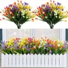 Dekorativa blommor lyser ditt utomhusutrymme med 4 buntar med UV-resistenta konstgjorda