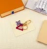 Fashion Brand Keychain Letter Designer Keychains Metal Keychain Womens Bag Charm Pendant Auto Parts F132