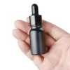 Garrafas de óleo essencial de vidro preto fosco Garrafa conta-gotas com tampa de alumínio anodizado brilhante 5ml 10ml 15ml 30ml 50ml 100ml Rwtbh