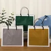 쇼핑백 PVC 두꺼운 토트 여성 휴대용 가방 핸드백 방수 선물 상자 접힌 옷 재사용