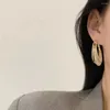 Çember Küpe 2023 Modaya Dokunma Dokuma Oval Kadınlar için Cazibe Altın Kaplama İçi Boş Çıkış Lüks Düğün Gelin Takı