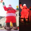 Atividades ao ar livre novo Gaint inflável Papai Noel 10 m 33 pés de altura grande vermelho explodir réplica de Natal do pai para decoração de Natal