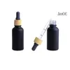 Matte Black Glass e liquid Essential Oil Perfume Bottle with Reagent Pipette Dropper and Wood Grain Cap 10/30ml Pceud