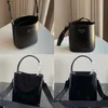 10A Plain Light Black Classic High Quality Bucket Bag Crossbody para Mulheres Bolsas Luxurys Bolsas Designer Show Prado Bags Black Letter Genuine Leather