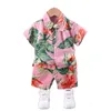 Kläder sätter sommar pojke blommor tryckta kläder kostym kort ärm skjorta barn semester strand outfit toppar 2 st baby dräkter för 1 2 3 4 5 6 t 230422