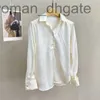 Polo da donna Designer Abbigliamento da donna, camicia a maniche lunghe in seta da donna, fibbia per borsa, decorazione con fibbia in vetro, comoda camicia da donna tinta unita JZNB