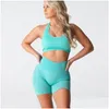 Tenue de yoga nvgtn illimité à côte de soutien-gorge sans couture de soutien-gorge sans couture pour femmes ouvr