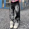 Herr jeans graffiti skalle tryck par 2023 hösten amerikansk mode gata casual lös hip-hop raka ben byxor unisex