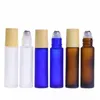 10 ml Amber Blue Clear Frosted Glass Roll On Bottle Essential Oil Parfume Bottle Travel Dispenser Bottle Steel Roller Ball Wood Grain CA ISJT