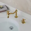 Robinets de lavabo de salle de bain Robinet de bassin en laiton poli doré de luxe Répandu 3 trous Mitigeur à double poignée en croix