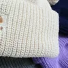 Czapki czapki/czaszki projektant luksusowy jesienna i zimowa podwójna warstwa zagęszczona wełniana czapka z dziesięcioma lub pięcioma kolorami duża etykieta haft 3D dla mężczyzn i kobiet