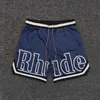 Designer Vêtements Rhude 2022ss Classique Imprimé Mesh Shorts De Sport Couples Joggers Sportswear Plage fitness en plein air À vendre