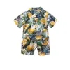 Kläder sätter sommar pojke blommor tryckta kläder kostym kort ärm skjorta barn semester strand outfit toppar 2 st baby dräkter för 1 2 3 4 5 6 t 230422