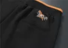 Luksusowe męskie dresy projektantów męskiej odzieży sportowej luksusowy męski bawełniany długi -sleved klasyczny modny kieszonkowy kieszonkowy ubrania męskie, spodnie odzieżowe kurtki kurtki