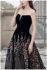 2023 Evening Dresses Black Prom Gowns Sexy Strapless Lace-Up Back Sweep Train Runway Party Wearing Tulle with Beading Sequins