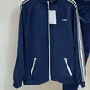 MEN MAWN TRACKSUITS 2023 أحدث الرجال والنساء غير الرسميين CE خطاب التطريز السراويل السوستة سترة سترة فضفاضة بدلة رياضية 230421