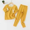 Conjuntos de roupas infantis outono terno roupa interior térmica traceless de Rong meninos e meninas pijamas calças primavera roupas infantis 231122