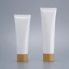 Tubos de plástico brancos vazios para apertar frascos de creme cosmético recarregável para viagem recipiente de bálsamo labial com tampa de bambu Rcnhe