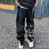 Herr jeans graffiti skalle tryck par 2023 hösten amerikansk mode gata casual lös hip-hop raka ben byxor unisex