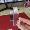 60 ml desinfectante de manos vacío botella de plástico PET con tapa abatible botella de forma trapezoidal para maquillaje líquido desinfectante líquido Nmtfd
