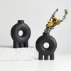 Wazony wazon sztuki w stylu nordyckim jest bardzo prosty i abstrakcyjny. Ciche wiatrowe ceramiczne dekoracje kwiatów domowych terrarium