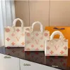 2023 HOT Fashion Handbag Delicate Crossbody Bag Printed Fresh Jungle Bag Simple Luxury leather design Ladies large capacity tote bag a1