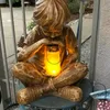 Glimpses of God Boy Standbeeld Pasen Tuindecoratie Hars Ornament met LED-licht Zonne-energie 210318216p