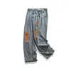 Мужские джинсы осень 2023 моющиеся рваные оранжевые джинсовые брюки с рваными осенними брюками