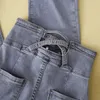 Kvinnors jeans sida delade enstaka bröst oregelbundna höga midja nio poäng något blossade byxor kvinnlig vår och sommar