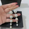 Mode femmes chaîne Stud perle amour Dangle concepteur printemps plaqué or boucles d'oreilles cadeau de fête de mariage bijoux en gros