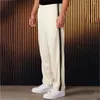 Pantaloni da uomo joggers pantaloni della tuta nastro nero giuntura di pantaloni ricamati a strisce casual