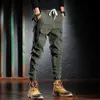 Jeans da uomo Moda uomo Streetwear Uomo Alta qualità Vestibilità ampia Multi tasche Pantaloni cargo casual verdi Pantaloni Hombre Harem Hip Hop