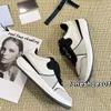 Mulheres de alta qualidade sapatos casuais marca francesa de couro apartamentos femininos início da primavera novo couro panda preto e branco tênis designer