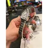 Orologi da polso Orologio da donna con cinturino in acciaio intarsiato con diamanti alla moda Orologio da donna al quarzo serpente Argento Prestazioni impermeabili 50 m