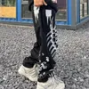 Herr jeans graffiti skalle tryck par 2023 hösten amerikansk mode gata casual lös hip-hop raka ben byxor unisex