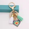 Porte-clés amour coeur pendentif en cuir gland pour femmes plaqué or voiture porte-clés mode sac à main breloques bijoux chaîne