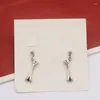 Dangle Boucles D'oreilles Bijoux De Mode Pièces Ancienne Couleur Argent Foncé Gothique Punk Os De La Mort Cool Simple Goutte D'oreille VGE033