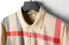2023 Summer Fashion Polo T-shirt da uomo Casual T Shirt Polo in cotone con medusa ricamata High Street Collar Polo Camicie New Style Trendy