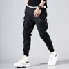 Хип -хоп мужчина Pantalones Hombre High Street Kpop повседневные грузовые брюки со многими карманами бегут брюки Modis Streetwear Harajuku0rf0