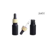 Matte Black Glass e liquid Essential Oil Perfume Bottle with Reagent Pipette Dropper and Wood Grain Cap 10/30ml Qakht