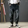 Jeans da uomo Uomo Retro Blu Stampato Designer Tasca grande Pantaloni cargo casual Hombre Jogging Hip Hop Sciolti strappati