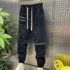 Męskie dżinsy jeansowe zimowe hip hop harajuku streetwear multi-zip czarne breski grube ciepłe na zewnątrz swobodne spodnie do jogger marki odzież ubrania