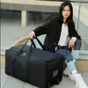 Duffel Bags large capacity foldable travel bag on wheels air consignment package high capacity storage luggage handbag 231122