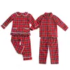 Set di abbigliamento Pigiama per neonati Pigiama rosso a quadri in flanella abbinato Pigiama per bambina per ragazzi Famiglia Pigiama natalizio per fratelli unisex per bambini 231122