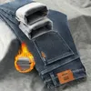 Jeans masculinos 2023 inverno quente baggy velo calças compridas negócios moda engrossar calças estiramento marca denim recreação 231122