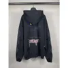 24SSデザイナーBalencaigaity Hoodie Balanciaga B Familyの新しいパリタワーグラフィティハンドペイント