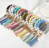 14 Farben Holz Quaste Bead String Armband Schlüsselanhänger Lebensmittelqualität Silikon Perlen Armbänder Frauen Mädchen Schlüsselanhänger Handschlaufe DB961 OJ6X