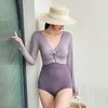 Costume da bagno firmato Nuova versione coreana sexy costume da bagno intero a maniche lunghe da vacanza Ragazza studentessa conservatrice che dimagrisce costume da bagno primaverile Bikini