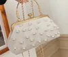 Nxy Luxury Wedding Party Clutch Bag Pearled Evening Handbag Female Striped Crossbody s for Women Metal Frame