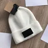 Berretto invernale lavorato a maglia berretto firmato cofano elegante cappelli autunnali per donna uomo cranio cappello da donna all'aperto cappelli da viaggio sci cappello lavorato a maglia